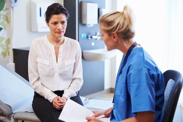 Doctor speaking to patient with rat bite