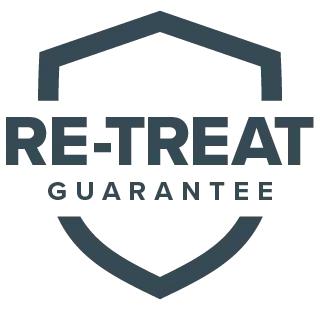 Re-Treat Guarantee logo. At Suburban Exterminating, if pests come back, so do we – to re-treat at no additional cost.