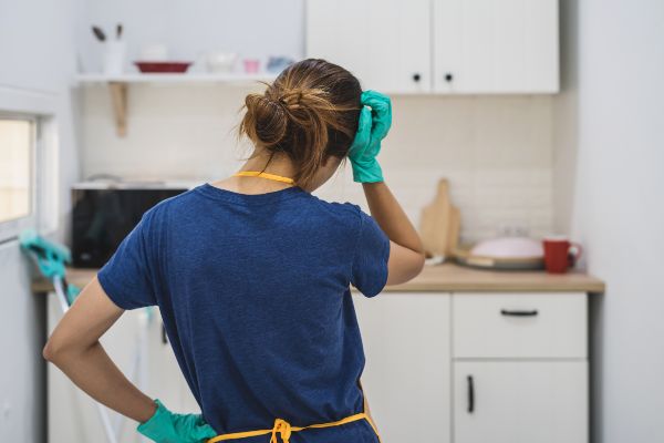 Woman with gloves ready to clean